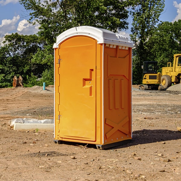 how often are the porta potties cleaned and serviced during a rental period in Waucoma